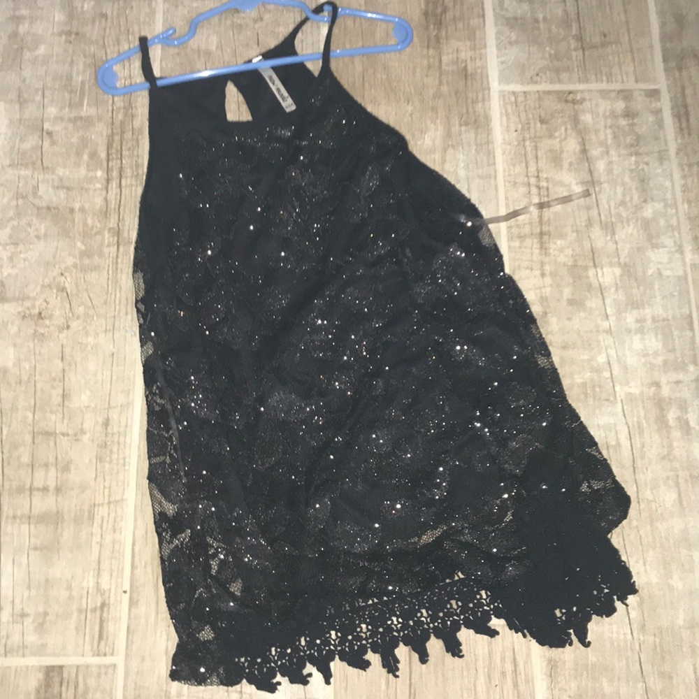 A black sparkly shirt